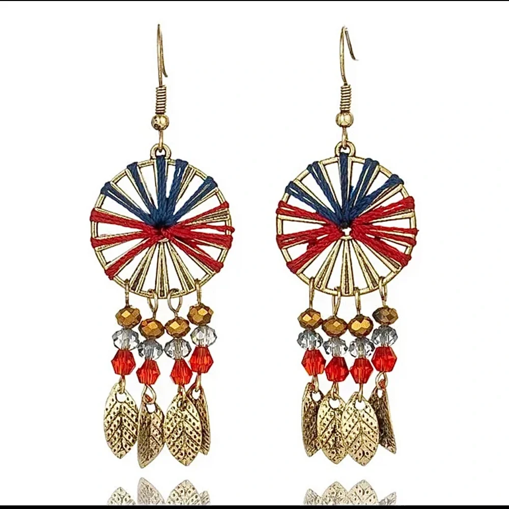 FERRIS WHEEL Southwestern pinwheel DANGLE earring gold feather leaf dangling - Picture 1 of 12
